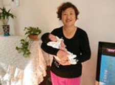 Confinement Lady Singapore Nanny Carry Baby Boy