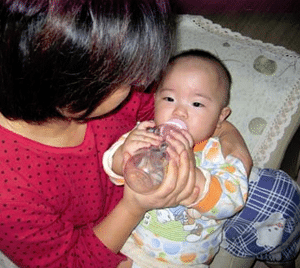 Singapore Confinement Nanny Feed Baby