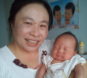 Confinement Nanny with Sleeping Baby - Singapore Confinement Nanny Agency