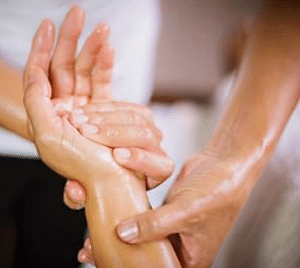 Post Natal Massage Therapist Massaging Hands