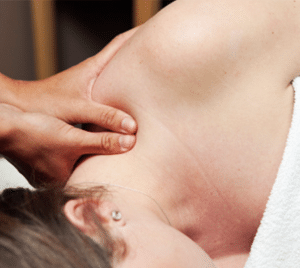 Post-Natal Massage Therapist Massaging The Neck